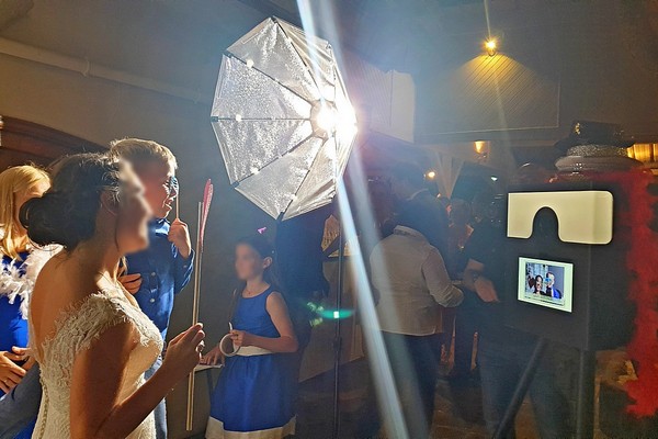 Wedding Photo Booth in Mauritius with girl and child posing with props