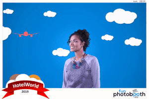 Animated photo with moving clouds, green screen and sky with model for Hotel World. Photobooth expo